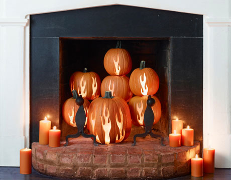pumpkin carving ideas inspiration, seasonal holiday d cor, thanksgiving decorations, Before the weather gets too chilly fill your fireplace with flame carved pumpkins for a beautiful display