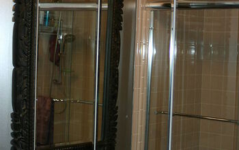 Replacing shower curtain with shower door