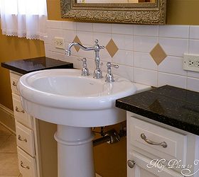 is a large bathroom possible in an old house yes it is, bathroom ideas, home decor, A pair of small cabinets recessed into a new plumbing wall flank a pedestal sink
