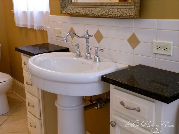 is a large bathroom possible in an old house yes it is, bathroom ideas, home decor, A pair of small cabinets recessed into a new plumbing wall flank a pedestal sink