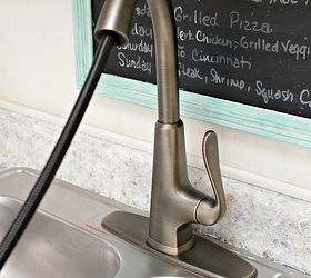 how to install a kitchen faucet, home maintenance repairs, how to, kitchen design, plumbing, Pull spray hose as far as it will go and place sink over holes
