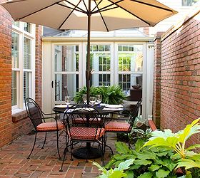 my ralph lauren courtyard, flowers, gardening, outdoor living, We removed an overgrown tree and created an intimate eating area The table needs to be near the kitchen to be more convenient for the cook