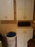 remodeling the laundry room, More cabinets to move