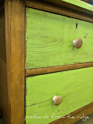 vintage oak dresser gets a new look, painted furniture, Closeup of the distressed drawers with the oak grain showing through