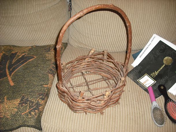 grapevine wreaths baskets i have made, crafts, seasonal holiday decor, wreaths, This one was real different used a square board w nails and worked the basket around that