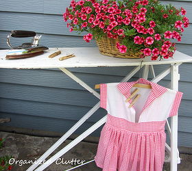 revisiting three whimsical junk garden vignettes, gardening, outdoor living, repurposing upcycling, The Ironing Board Vignette iron clothespins and homemade clothespin bag and a laundry basket of calibrachoa