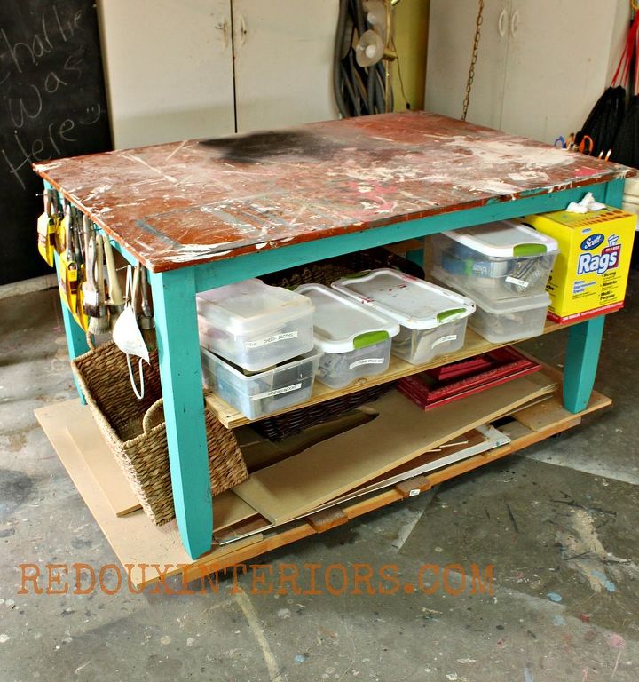 organize your garage using reclaimed and upcycled items, garages, organizing, repurposing upcycling, This is originally a dining table purchased for 5 I added a the base wheels and shelving with scrap wood Nails in the ends provide places for my brushes Now I have a moveable work station