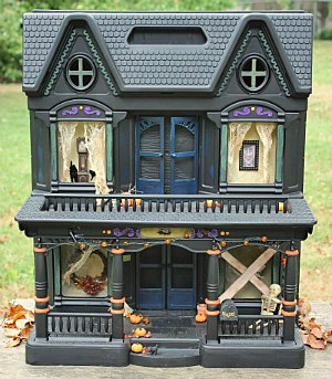 easy halloween decoration to make, crafts, halloween decorations, seasonal holiday decor, I saw this idea in an old issue of Country Living I thought it was so clever You just spray paint an old doll house black and turn it into a haunted house