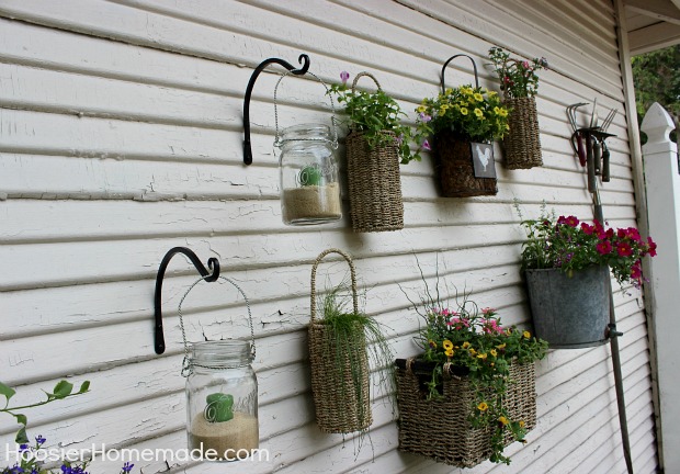 cottage garden landscaping, flowers, gardening, outdoor living, Close up of the baskets filled and the jars with sand and candles