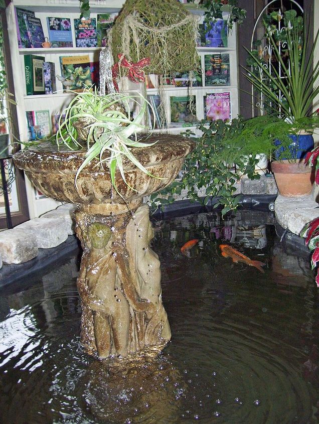 master bath with an attached koi goldfish pond, bathroom ideas, ponds water features, Our garden room and Koi pond inside the bathroom but with a trellis door to keep the cats out because some of the plants are not good for them to eat