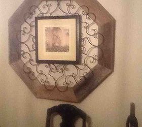 picture frames mirror frames ect, home decor, repurposing upcycling, I purchased the wrought iron had it for years I bought it at Hobby Lobby on sale The barn wood was in a field So it s free The picture was just hung on it I found the picture at a garage sale I needed color to tie it all together in the room