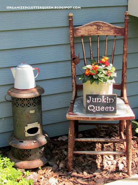the yard gardens patio of a junk collector, gardening, outdoor living, patio, repurposing upcycling, Chairs