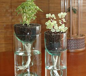 ideas on how to recycle wine bottles, self watering planter made from recycled wine bottle