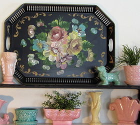 a tole tray inspired spring mantel, seasonal holiday decor, Pastel colored books and faux greenery round out the mantel display
