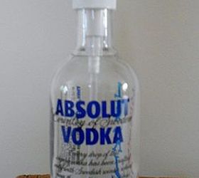 i upcycle an absolut vodka bottle into a soap dispenser and stamped the name, repurposing upcycling, front view