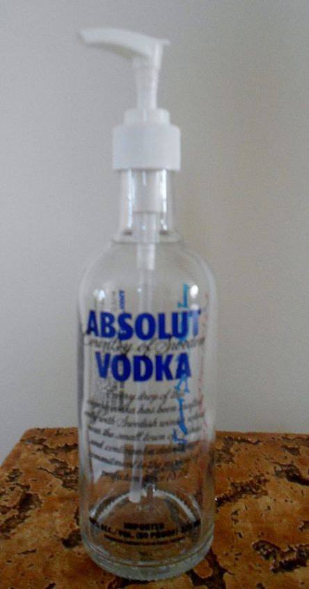 i upcycle an absolut vodka bottle into a soap dispenser and stamped the name, repurposing upcycling, front view