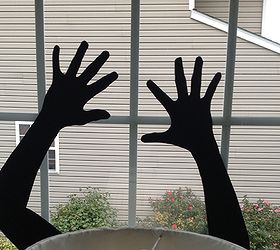 diy halloween silhouettes, crafts, halloween decorations, seasonal holiday decor, My son posed for this picture We added flying bats with this on his room window to make it look more frightening