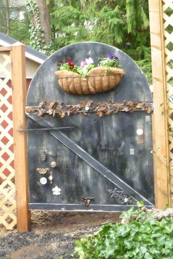 artsy flypaper gate, crafts, fences, gardening, painting, I painted it black and sanded it back then poly coat for durability