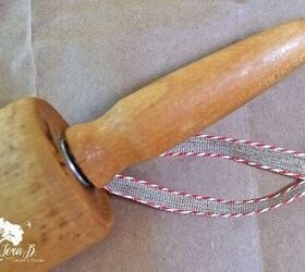 Tie a ribbon around a rolling pin to copy her adorable Christmas idea