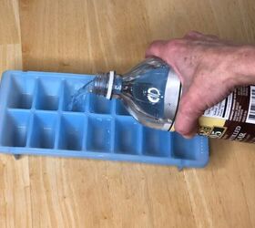 Pour vinegar in an ice cube tray for a fool-proof cleaning routine