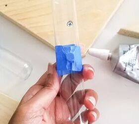 She glues a magnet to a test tube for the most beautiful summer decor idea