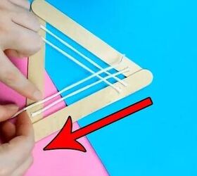 She glues thread inside popsicle sticks for a lighting idea that's kind of magical