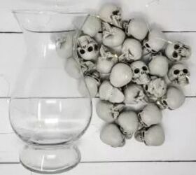 She starts by filling a vase with plastic skulls—the final look is just too cool