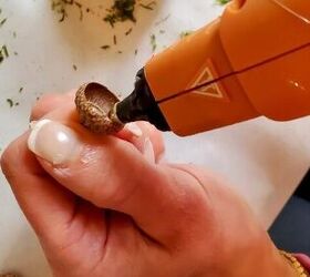Glue down acorn tops to make your Thanksgiving table look extra special