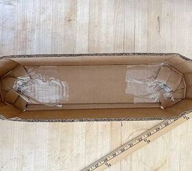 We've never seen anyone do this with a cardboard box, but we're copying it ASAP for our kitchens
