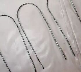 She bends and paints pieces of wire to get the cutest countertop accent we've seen in a while