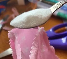 Spoon some baking soda into a small fabric pouch for this house-freshening hack