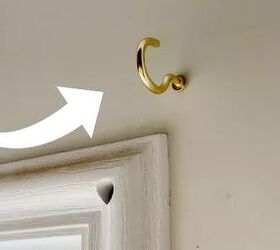 She hangs 2 cup hooks right above her door for this easy, $10 privacy hack