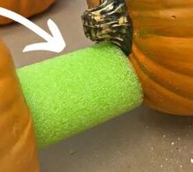 The wild reason she wedges a pool noodle between 2 pumpkins (wait 'til you see this porch!)