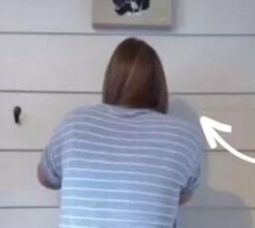 The clever reason this woman hangs 10 coat hooks halfway down her wall