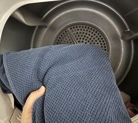 The shockingly simple reason some people toss a dry towel into their dryer