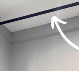 She just solved one of your worst laundry room eyesores with a curtain rod