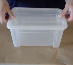 She takes the tops off of plastic dollar store bins for this gorgeous storage hack