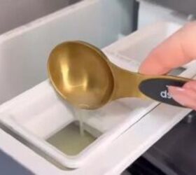 She spoons lemon juice into her washing machine for this easy, instant trick