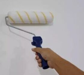 Roll a clean paint roller on your wall for this brilliant, paint-free hack!