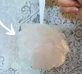 She pulls apart 2 dollar store loofahs for a porch idea her neighbors won't believe