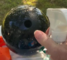 She brings 3 bowling balls into her garden and grabs the Windex for this gorgeous outdoor idea