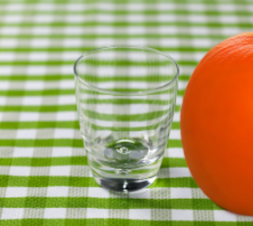 The wild reason she rolls a glass cup on her faux pumpkins