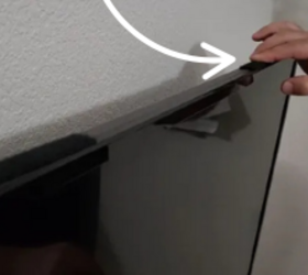 Stick a piece of velcro on your TV for this very clever upgrade idea