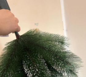 She holds a tree upside down for this clever, safer idea