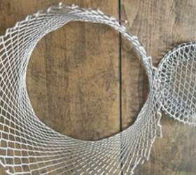 She cuts the bottom off her Dollar Tree waste basket for this gorgeous idea