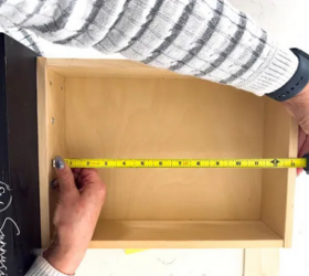 You might want to empty and measure your cabinet doors when you see her storage breakthrough