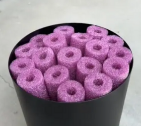 Fill a plastic planter with pool noodles for this simple and beautiful porch hack