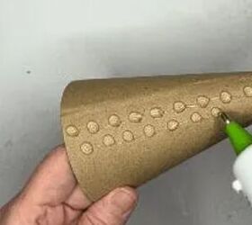 She uses hot glue to make her Christmas decor really stand out