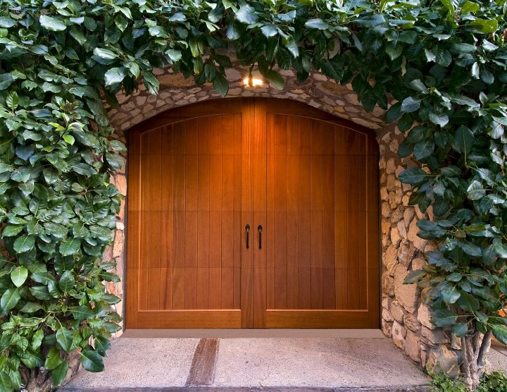 wood carriage house garage doors, Clopay Reserve Collection Custom insulated garage door Factory Stained Mahogany As seen on the DIY Network s Garage Mahal Jay Leno s Garage Makeover