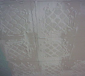 tin ceiling tile look for almost free with plaster and paint, Remove the stencil Repeat across your ceiling until all the tiles are there